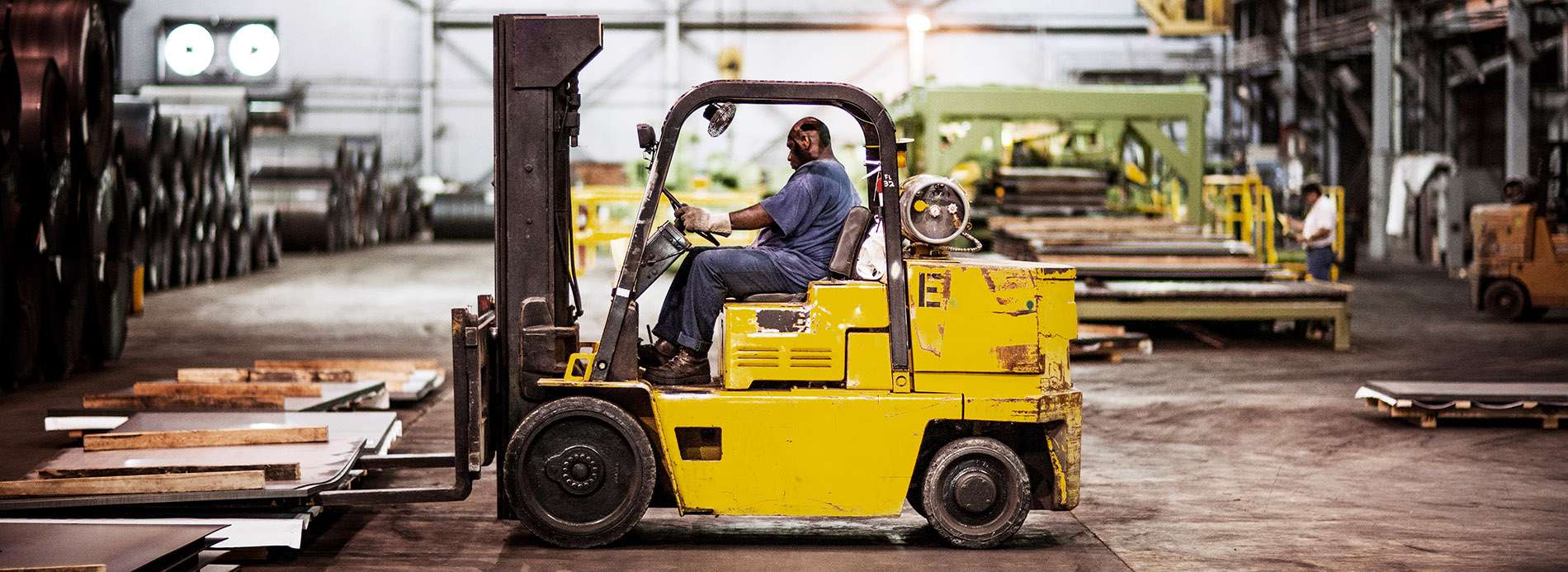man operating a forklift