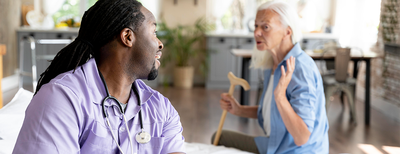 a nurse talking with a patient
