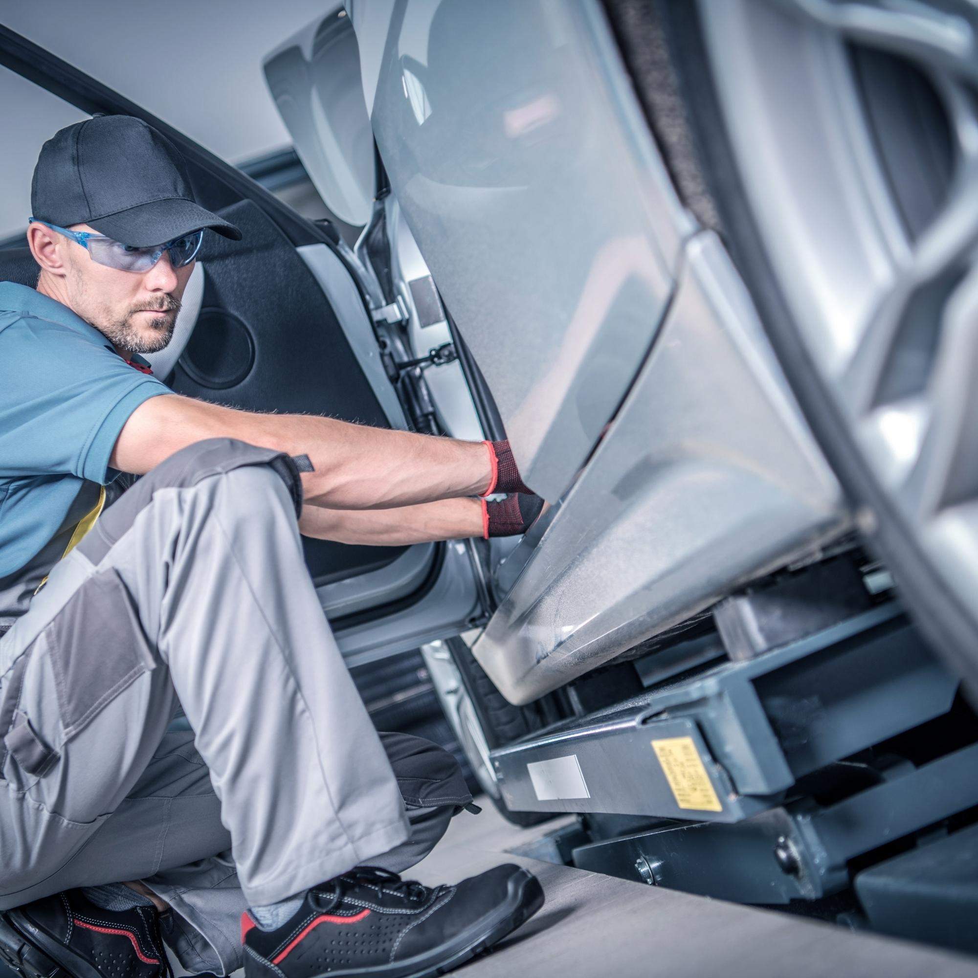 Mechanic working on a car